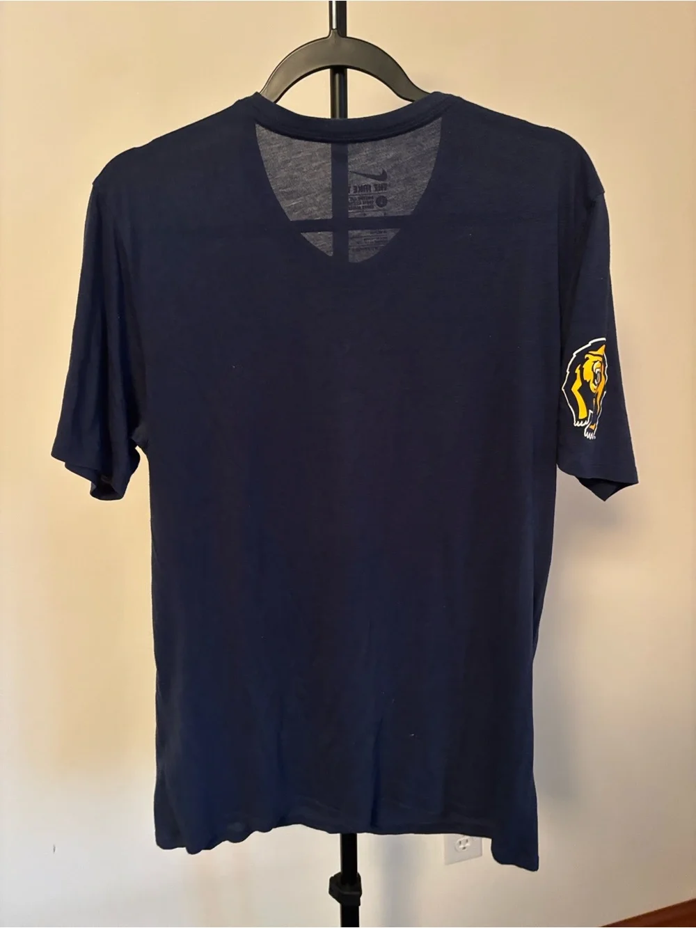Jordan Men's Navy Blue Short Sleeve Tee with Yellow 'CAL NEVER STOPS' Graphic